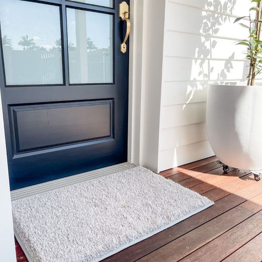 large light grey grass door mat